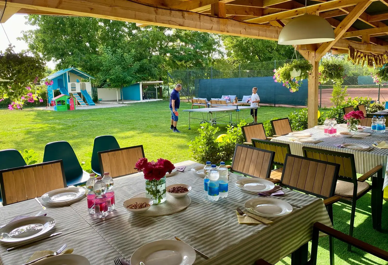 Sunlight Tennis Club garden terrace prepared for a community event